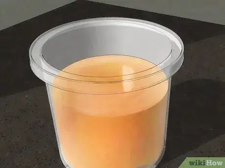 Step 3 Pour your oil into clear plastic containers.
