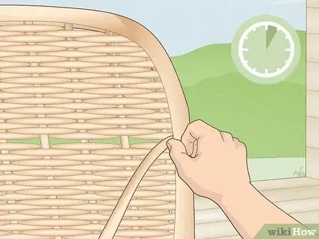 Step 5 Press the glued end of the rattan strand in place for 5 minutes.