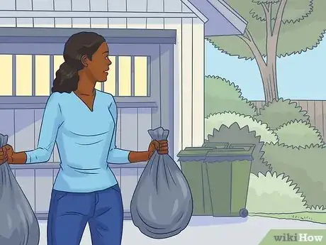 Step 4 Put your trash bins in a visible place so you can see them every morning.