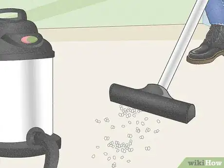 Step 4 Vacuum up tiny pieces with a bag or a shop vac.