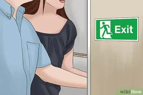 Step 2 Proceed quickly to an exit.