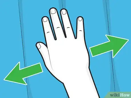 Step 2 Move the palm of your hand slowly along the surface of the mattress.