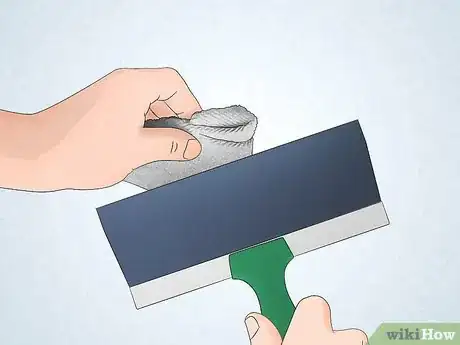 Step 11 Wipe off the knockdown knife blade after every stroke.