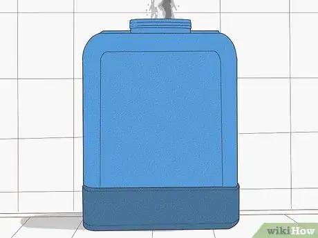Step 1 Fill a clean spray tank with 1 gallon (3.8 L) of water.