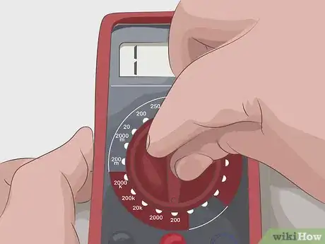 Step 2 Set your ohmmeter to the appropriate scale, if possible.