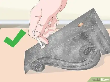 Step 3 Ensure your nail is the appropriate size for your keyhole or drilled hole.