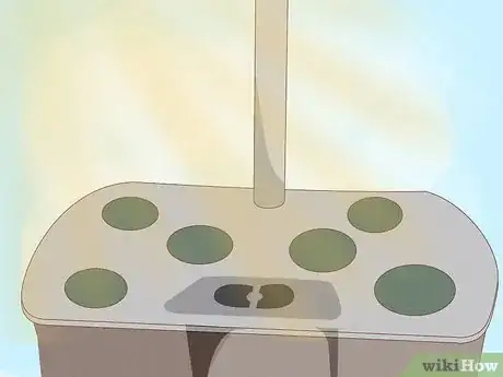 Step 4 Invest in an AeroGarden to grow plants from seeds inside your home.