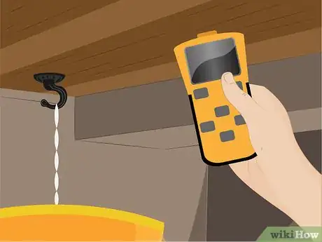 Step 10 Check for the presence of strapping or joists with the stud finder where additional swags are desired.