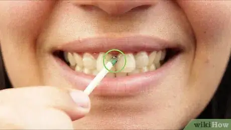 Step 7 For an extreme challenge, try striking on your teeth.